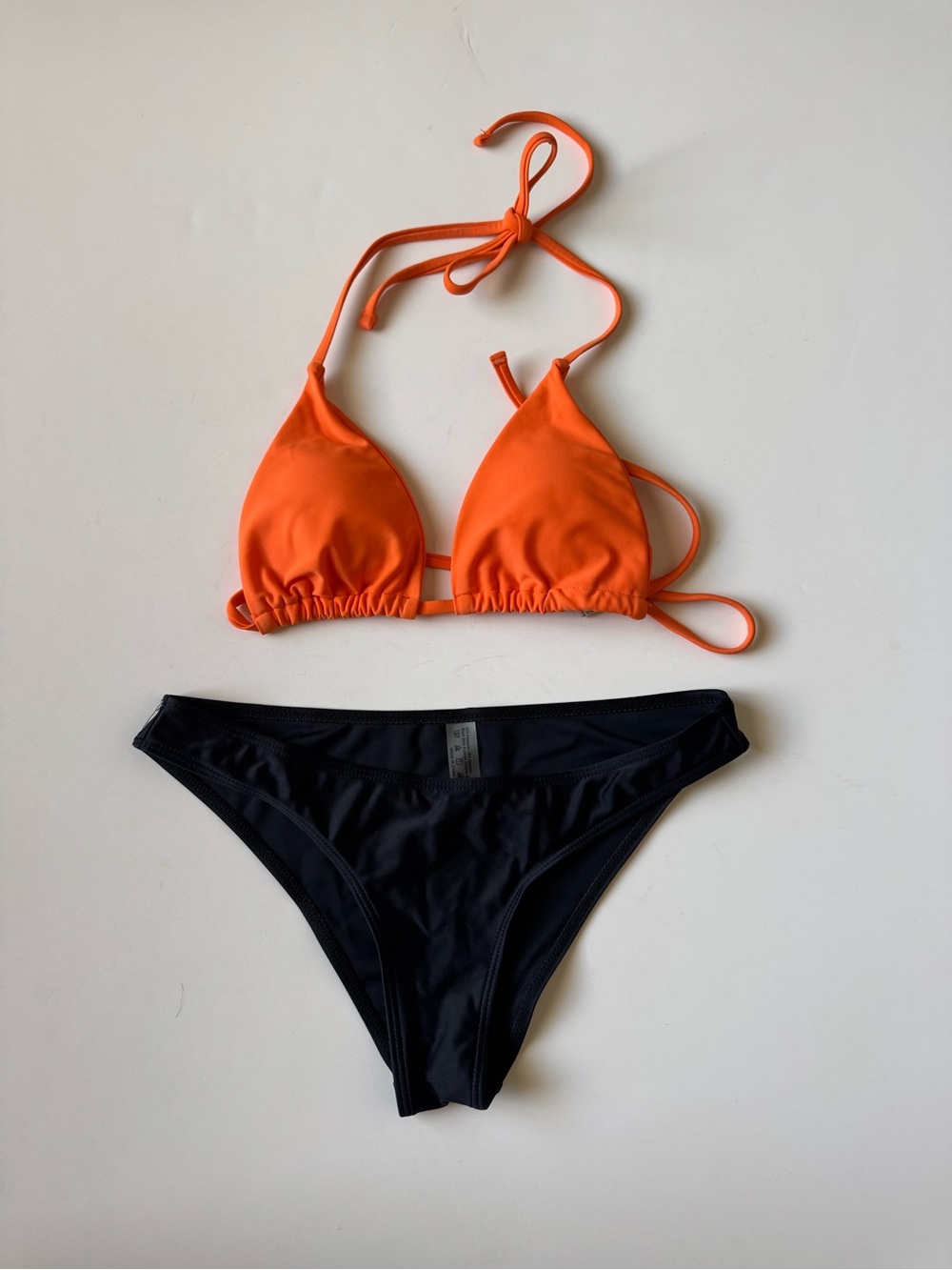 Orange Triangle Top with Black Bikini Bottoms